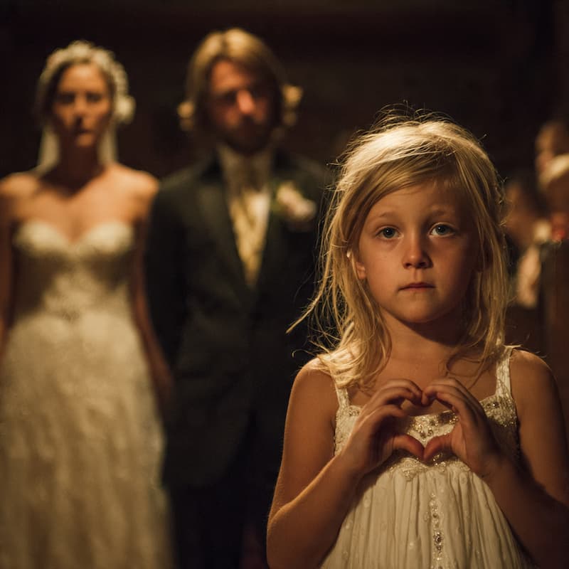 a girl standing in a wedding